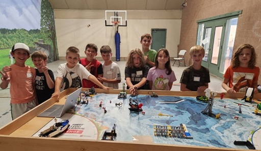 FLL students working on LEGO robot